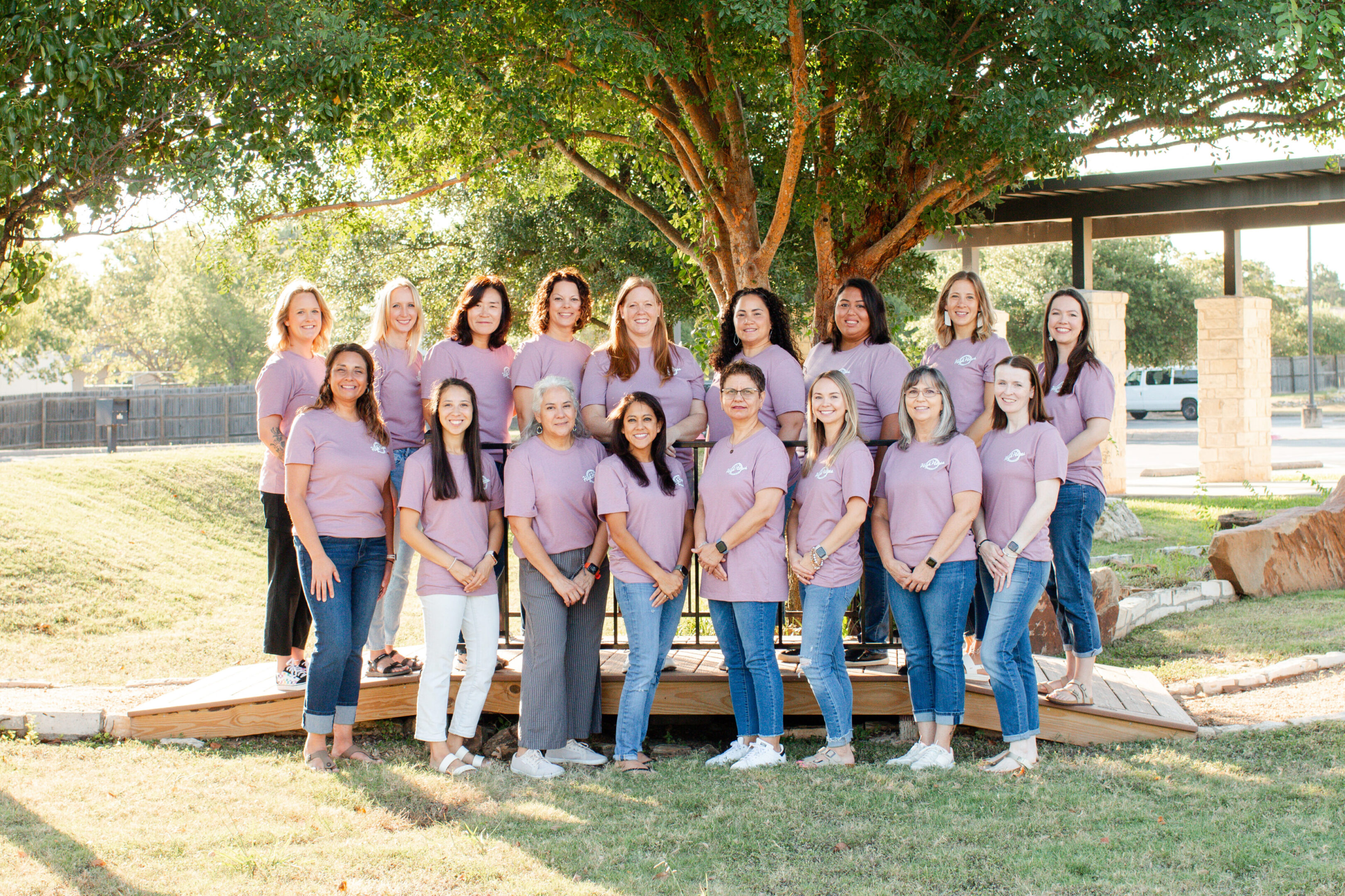 A group of women standing next to each other.